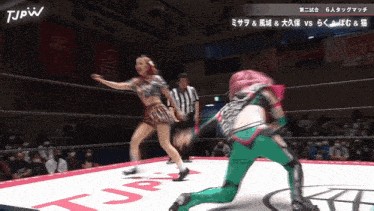 a woman in a wrestling ring with the letters tjpw on the bottom
