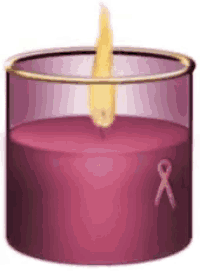 a purple candle in a glass with a ribbon on it