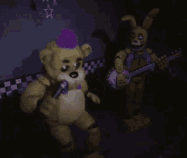 a teddy bear and a rabbit are standing next to each other in the dark .