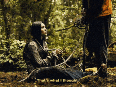 a woman is tied to a rope in the woods and says that 's what i thought