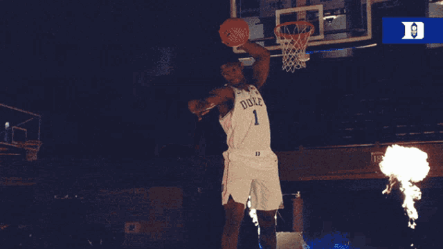 a duke basketball player is getting ready to dunk