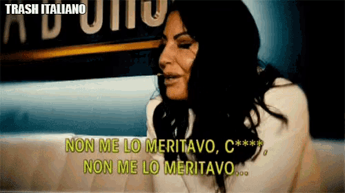 a woman says non me lo meritavo in a foreign language
