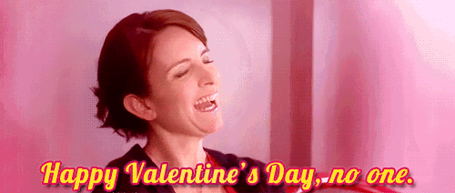 a woman is laughing and says happy valentine 's day no one