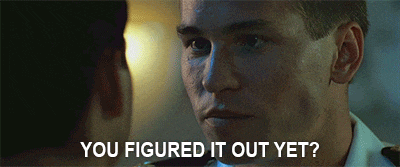 a man talking to another man with the words " you figured it out yet " above him