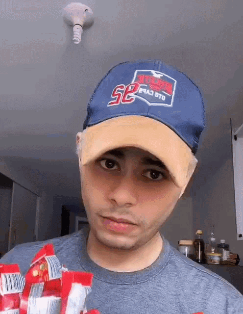 a man wearing a hat that says ' texas tech ' on it