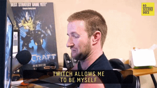 a man sitting in front of a computer with the words twitch allows me to be myself on the bottom