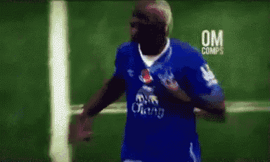 a soccer player wearing a blue jersey with the word chang on it