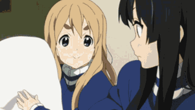 two anime girls are standing next to each other and one is smiling