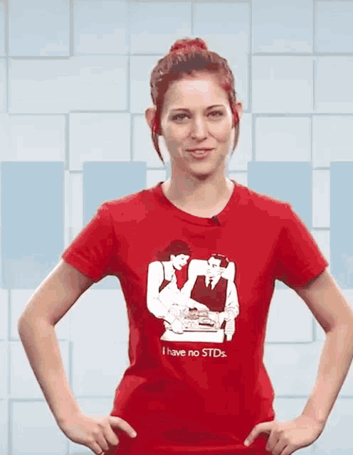 a woman is wearing a red t-shirt that says i have no stds