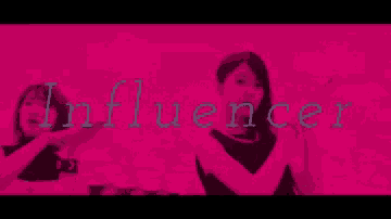 two women are standing next to each other in front of the word influencer .