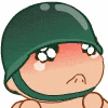 a cartoon soldier with a green helmet on his head and a red face .