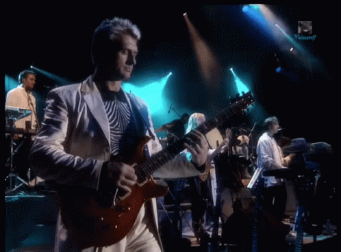 Mike Oldfield Live Performance GIF - Mike Oldfield Live Performance On Stage GIFs