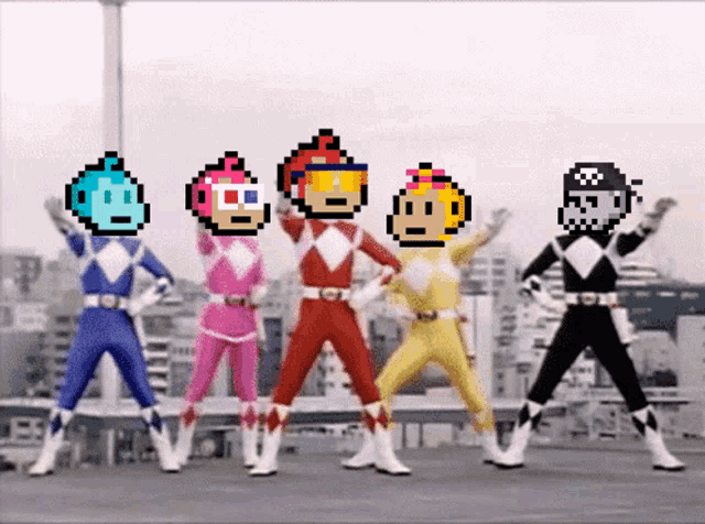 a group of power rangers are dancing together