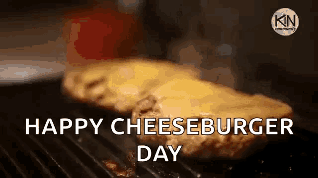 a cheeseburger is being cooked on a grill with the words happy cheeseburger day