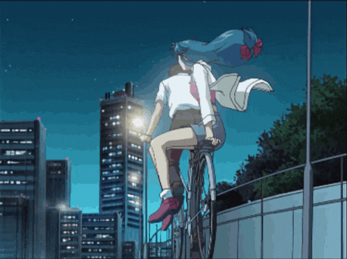 a girl with blue hair is riding a bike with a man behind her