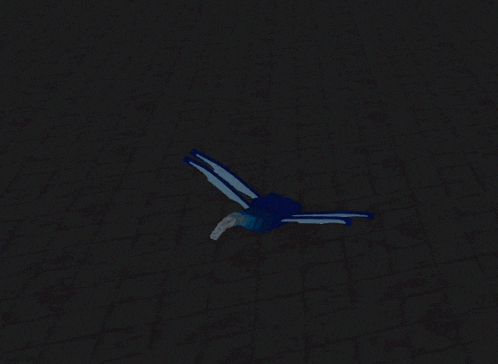 a blue dragonfly with white wings is laying on the ground in the dark