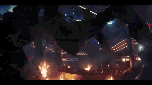 a giant spider is crawling in a dark room with a starcourt sign in the background