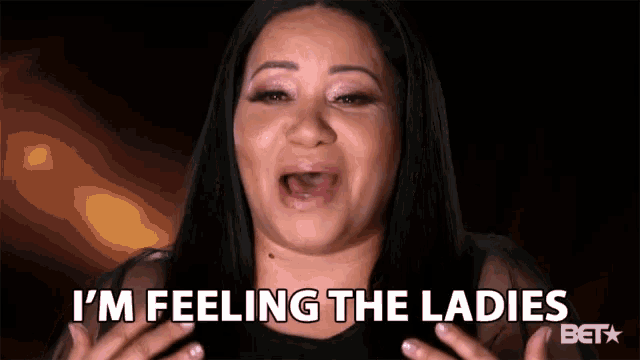 a woman says " i 'm feeling the ladies " in front of a bet logo