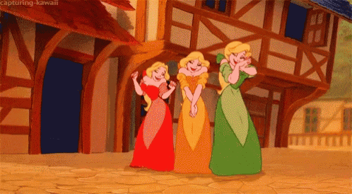 three princesses are standing next to each other in front of a building