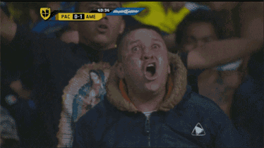 a soccer game between pac and ame is being shown on a television screen