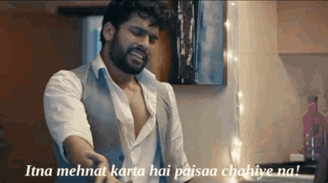 a man with a beard is standing in a kitchen with the words itna mehnat karta hai paisaa chahiye na on the bottom