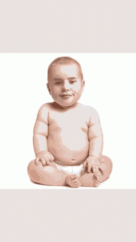 a baby in a diaper is sitting on a white background