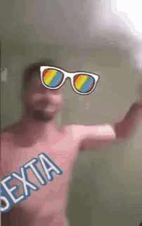 a shirtless man wearing sunglasses with the word sexta on it