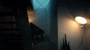 a dark hallway with a lamp and a piano in the corner
