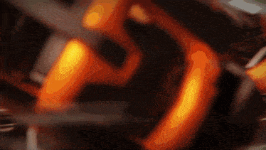 a close up of a blurred image of a flame