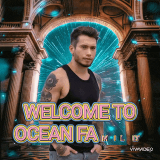 a man is standing in front of a building with the words welcome to ocean family on it