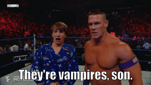 a wrestler says they 're vampires son while standing next to another wrestler