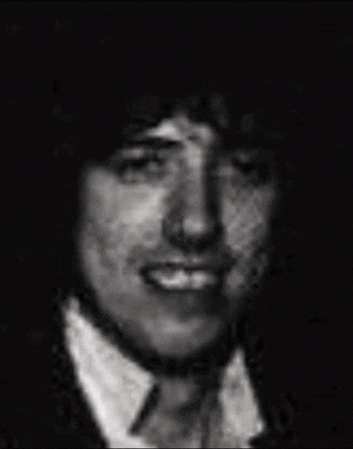 a black and white photo of a man in a shirt that says ' i love you '