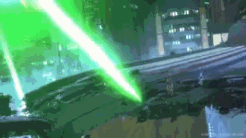 a green light is coming out of a building