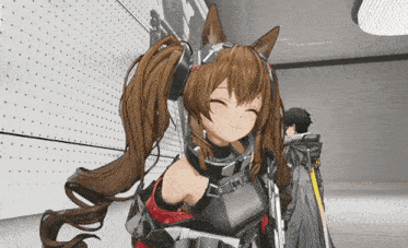 a girl with a ponytail is smiling in front of a white wall