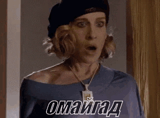 a woman wearing a beret and a necklace is looking surprised .