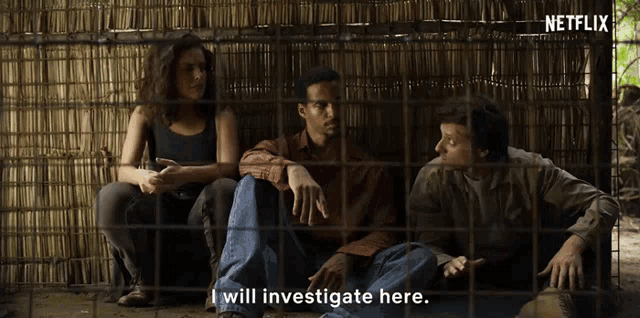 three people are sitting in a cage with the words i will investigate here