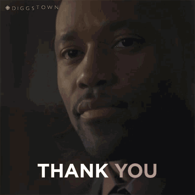 a close up of a man 's face with the words thank you in the corner