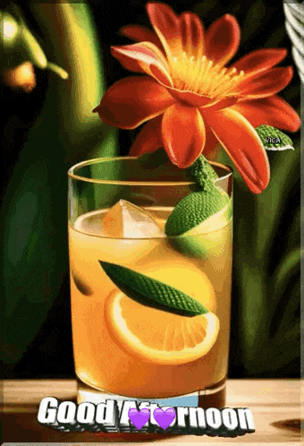 a glass of orange juice with a flower on top and the words good afternoon