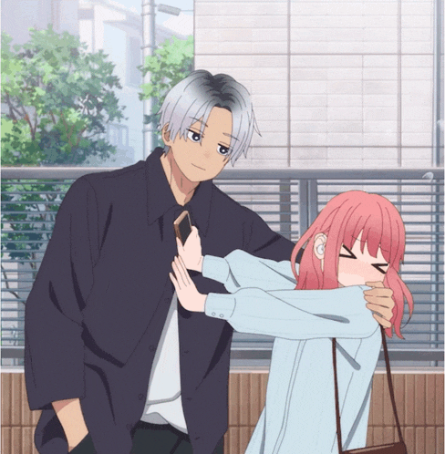 a girl with pink hair is hugging a man with gray hair