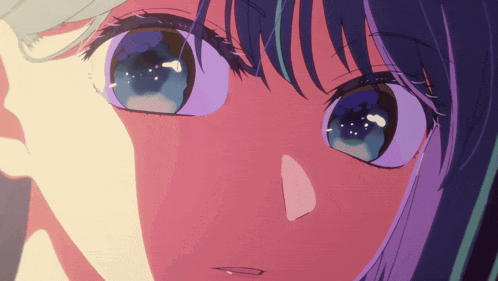a close up of a girl 's face with purple hair and blue eyes