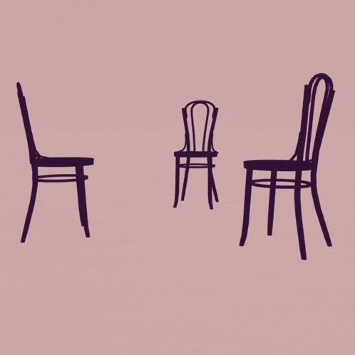 a silhouette of an empty bird cage on a pink background