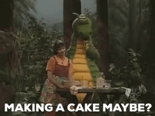 Dudley The Dragon Making A Cake Maybe GIF - Dudley The Dragon Making A Cake Maybe Cake GIFs