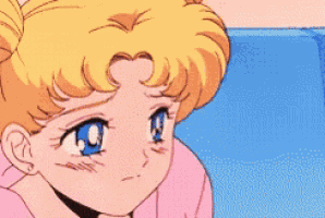 a couple of anime characters are standing next to each other and looking at each other .