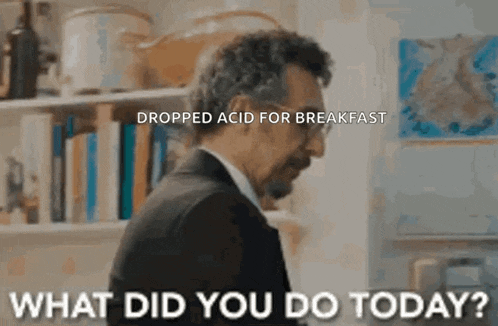 a man in a suit says " dropped acid for breakfast "