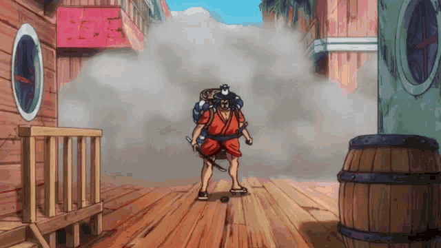 a man in a kimono is standing on a wooden floor holding a sword