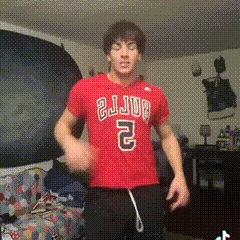 a man is wearing a red shirt with the number 2 on it