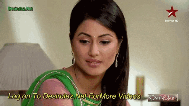 a woman 's face is shown on a screen that says log on to desirulez net for more videos