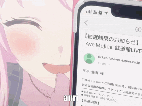 a girl with pink hair is smiling while holding a cell phone with an email from ave mujica on the screen