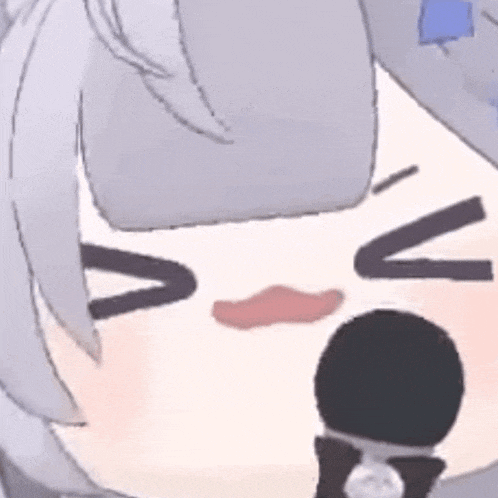 a close up of a cartoon character 's face with a microphone in front of it .