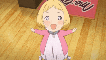 a little girl is standing in front of a pink mat that says ' mama ' on it